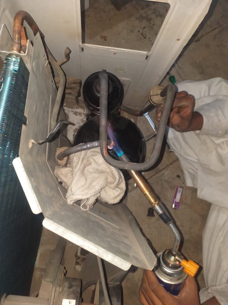 Repairing an AC compressor
